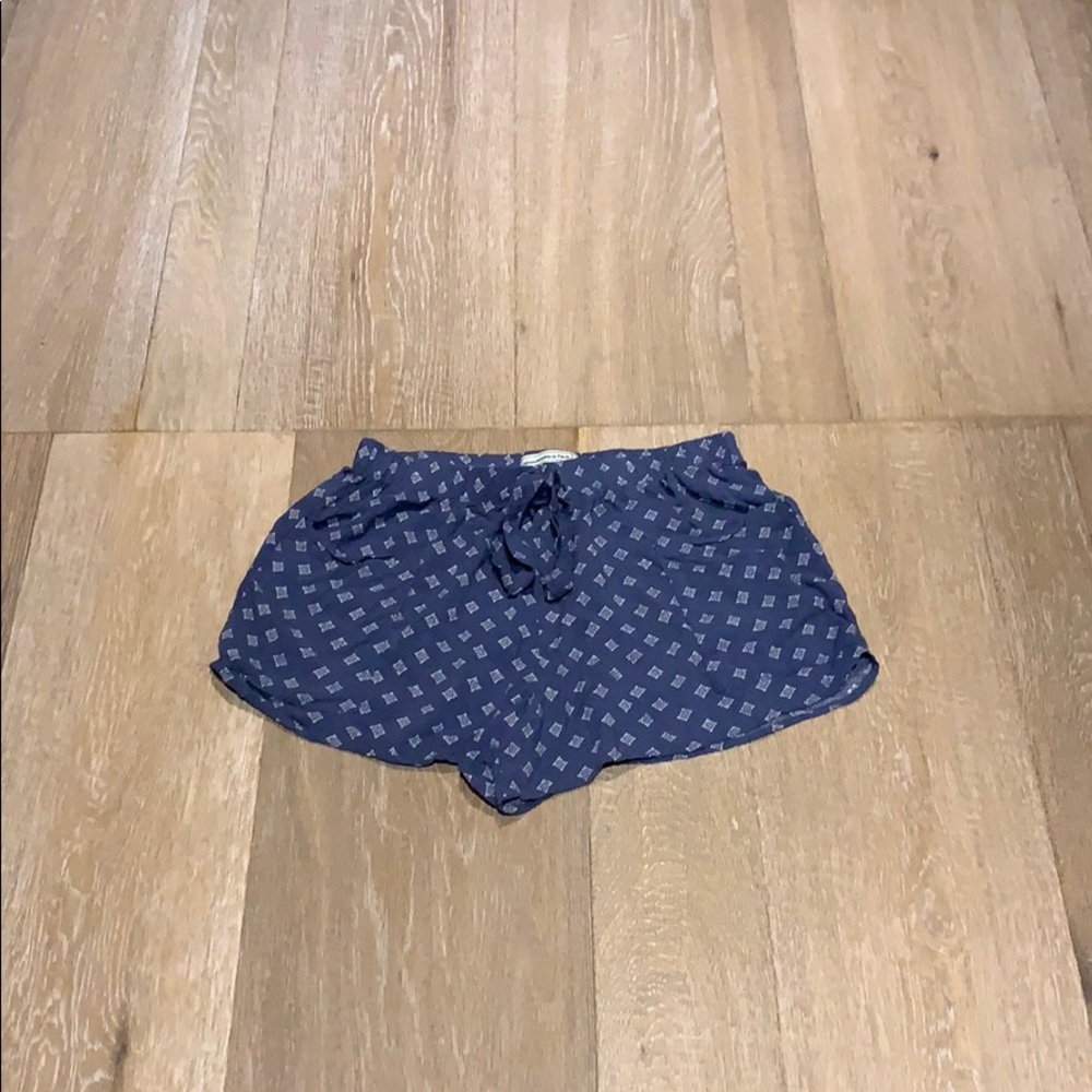Flowy blue & white patterned shorts